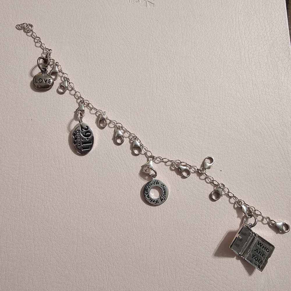 Faith Based Charm Bracelet with charms some Sterling Silver